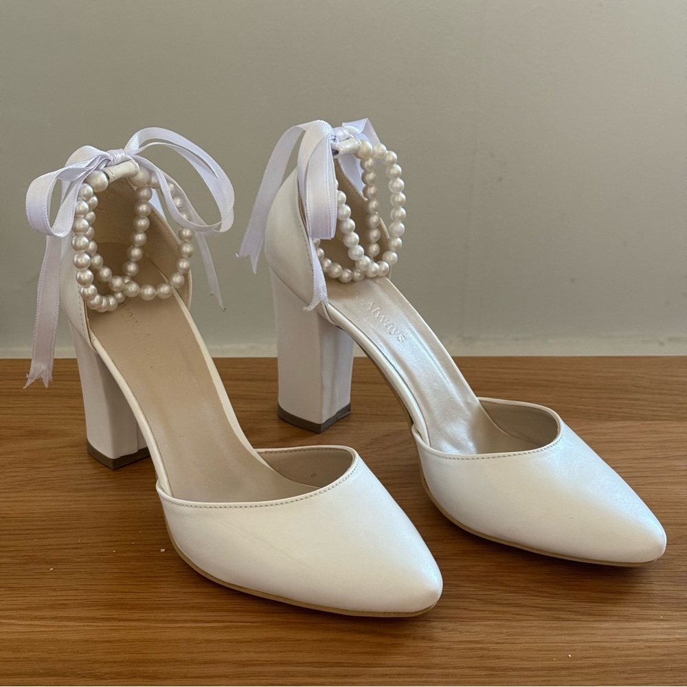White High-Heeled D’orsay Pumps with Ribbon Bow and Pearl Embellishment